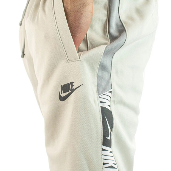Штани Nike NSW Repeat Poly-Knit Jogger DM4673-072 (Оригінал) - фото №2 Штани Nike NSW Repeat Poly-Knit Jogger DM4673-072 (Оригінал) - фото №2