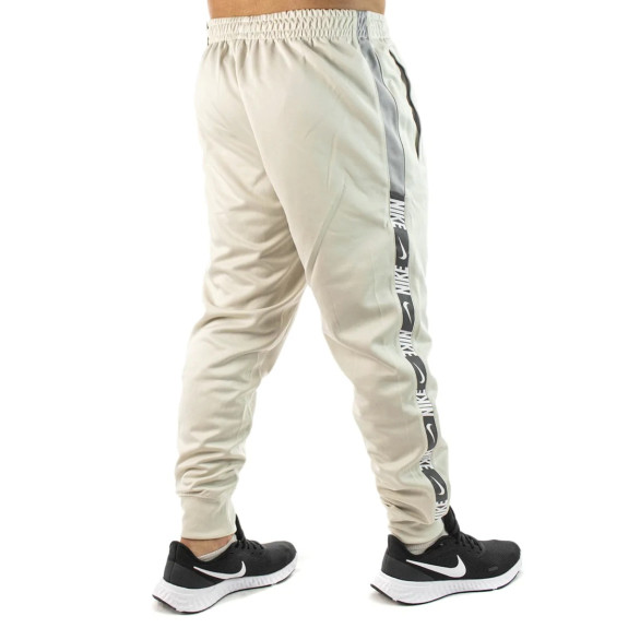 Штани Nike NSW Repeat Poly-Knit Jogger DM4673-072 (Оригінал) - фото №5 Штани Nike NSW Repeat Poly-Knit Jogger DM4673-072 (Оригінал) - фото №5